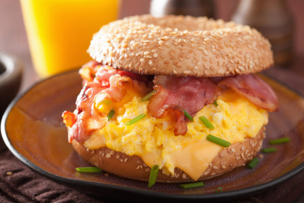 A sesame bagel topped with bacon, egg, and cheese is a fine choice.