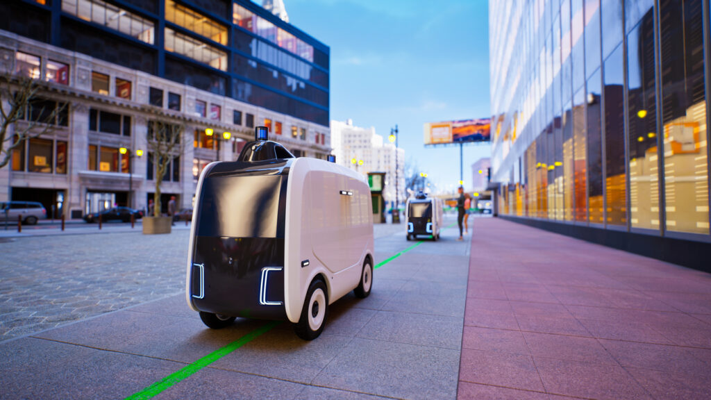 A photograph of an autonomous robot. It is a box with wheels. With Brooklyn co-developing mail robots they might become a more common thing.