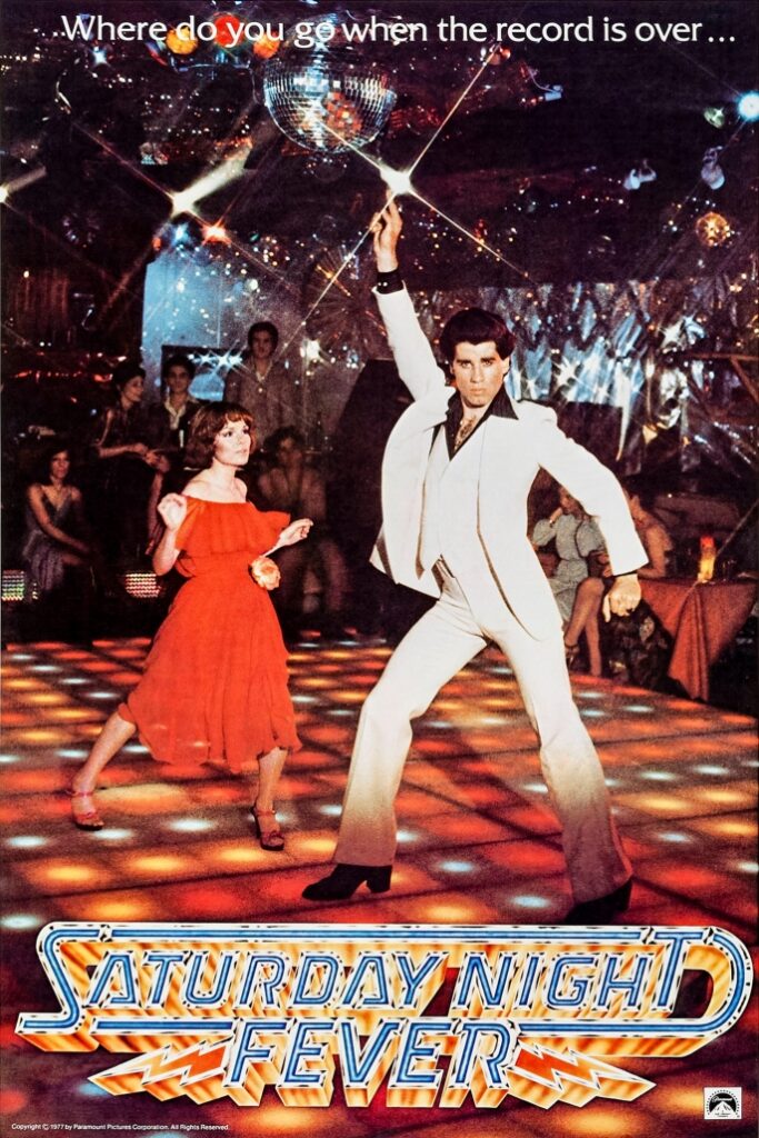 A promotional poster from the movie Saturday Night Fever, a movie featuring Brooklyn-style pizza.