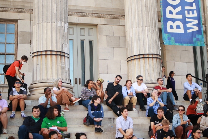 An audience listening to a live reading at the main stage by Brooklyn Borough Hall.