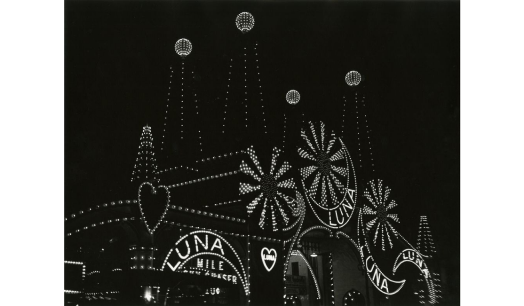 The original Luna Park entrance lit at night.